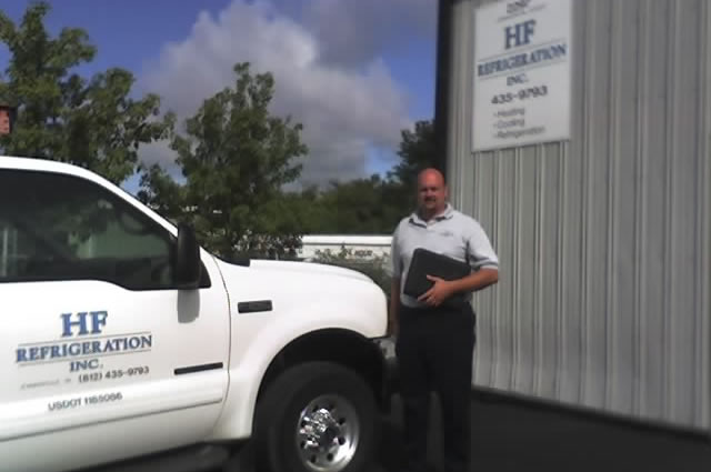 HF Refrigeration service truck and company representative
